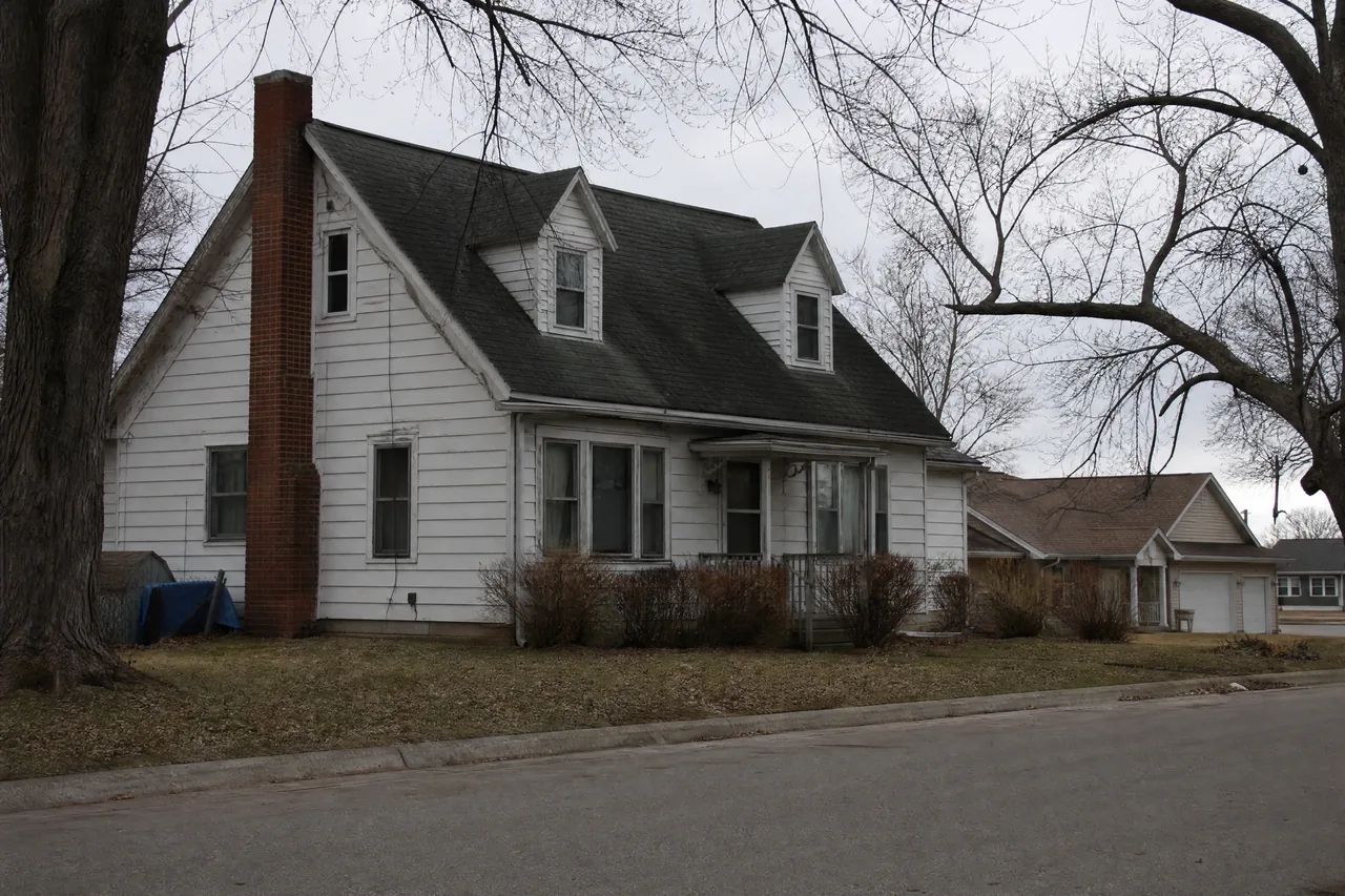 Older steep cut-up roof with dormers on a North Aurora IL home