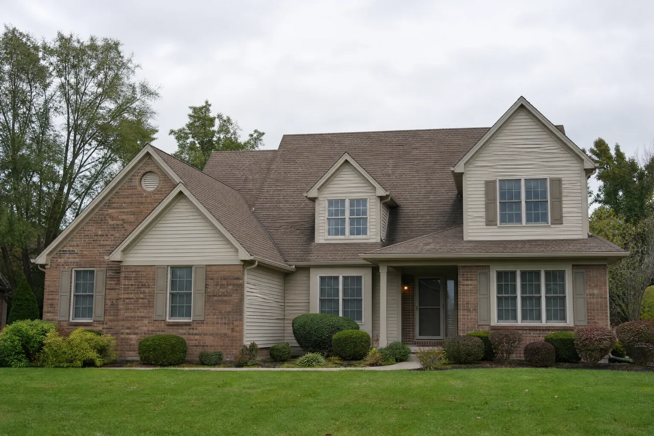 Complicated multi-gable roofline on a 2000s built home in Yorkville IL